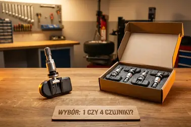 Pojedynczy czujnik TPMS obok kompletu czterech sensorów przeznaczonych do dodatkowego zestawu kół